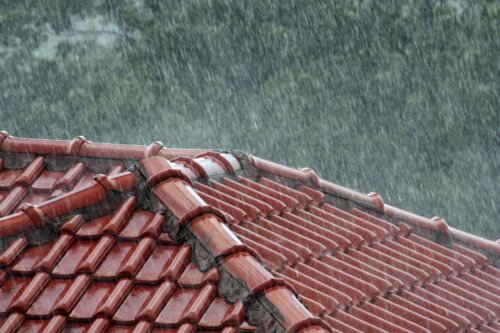 A roof with rain falling, designed by a home designer.
