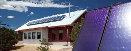 An architect's solar panel installation in front of a Santa Fe house.