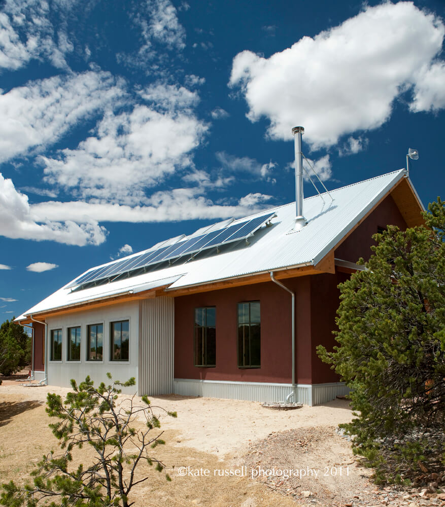 A Santa Fe home builder designed a house with solar panels on the roof.