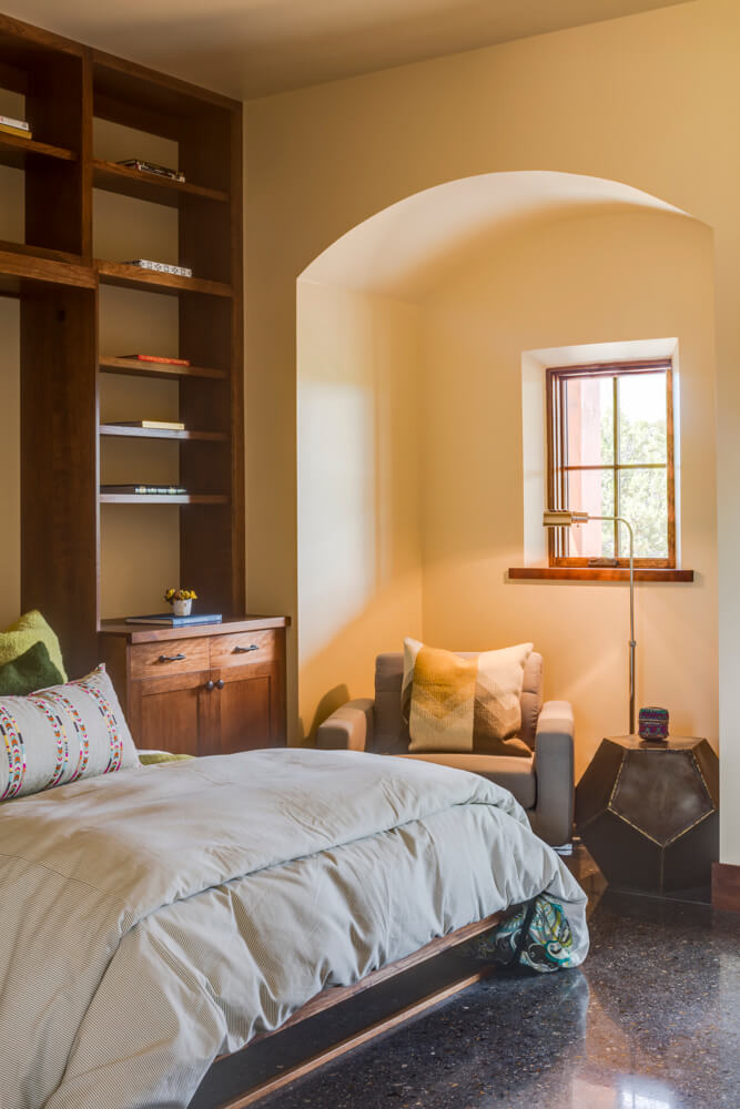 A Santa Fe-style bed in a bedroom.