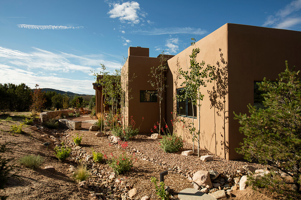 A Santa Fe inspired adobe house in the desert, built by a talented home builder and designed to perfection by a skilled home designer.
