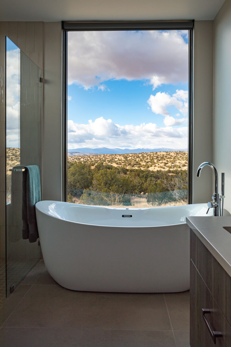 A Santa Fe home designer created a bathroom with a bathtub featuring views of the desert.